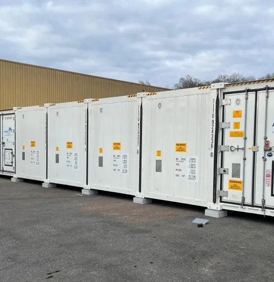 Modular cold storage container installation forming a SuperStore unit