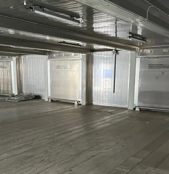 Modular cold storage container installation forming a SuperStore unit