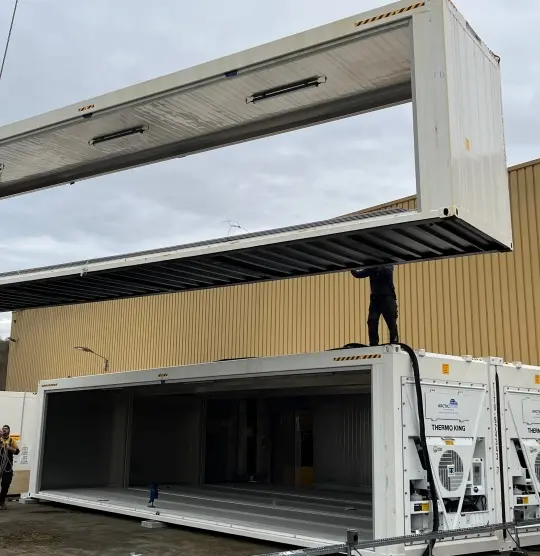 Modular cold storage container installation forming a SuperStore unit